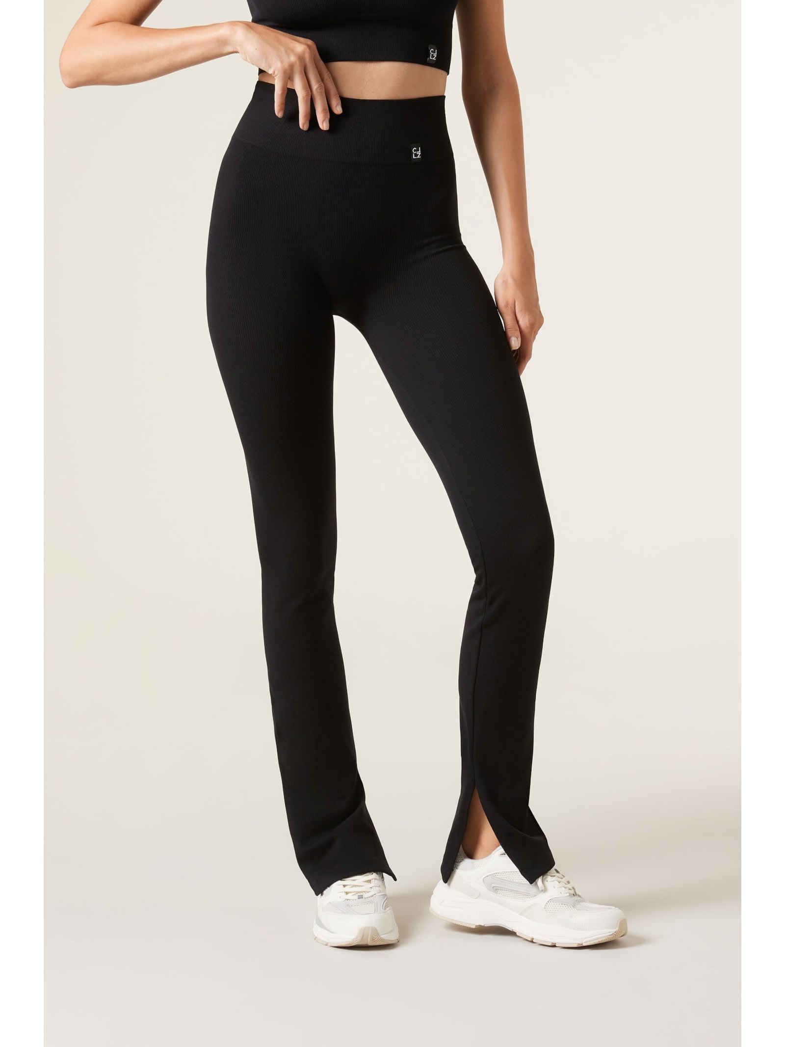 Legging Flare Com Abertura Lateral Preto - Main Image