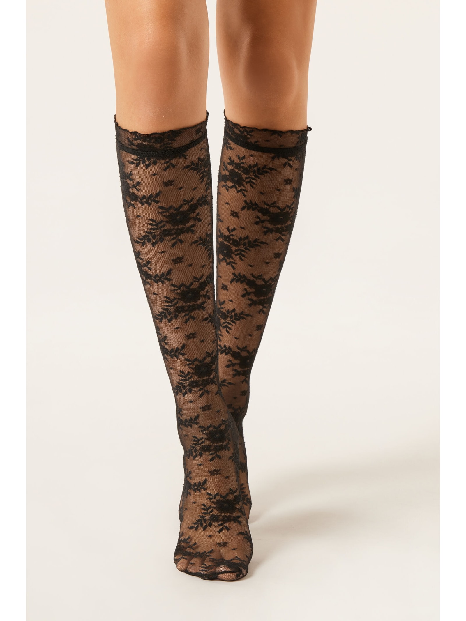 Meia Alta Em Renda Com Padrão Floral Preto Calzedonia