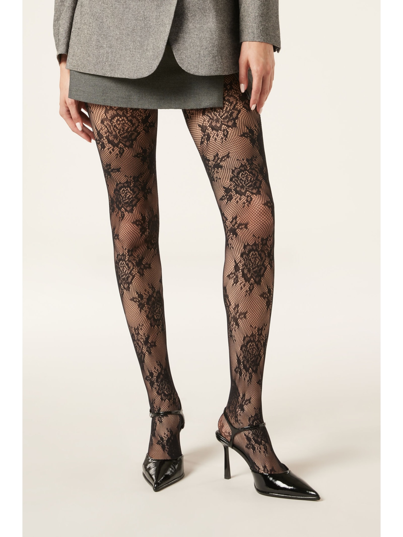 Meia-Calça Arrastão Com Flores Sofisticadas Preto Calzedonia