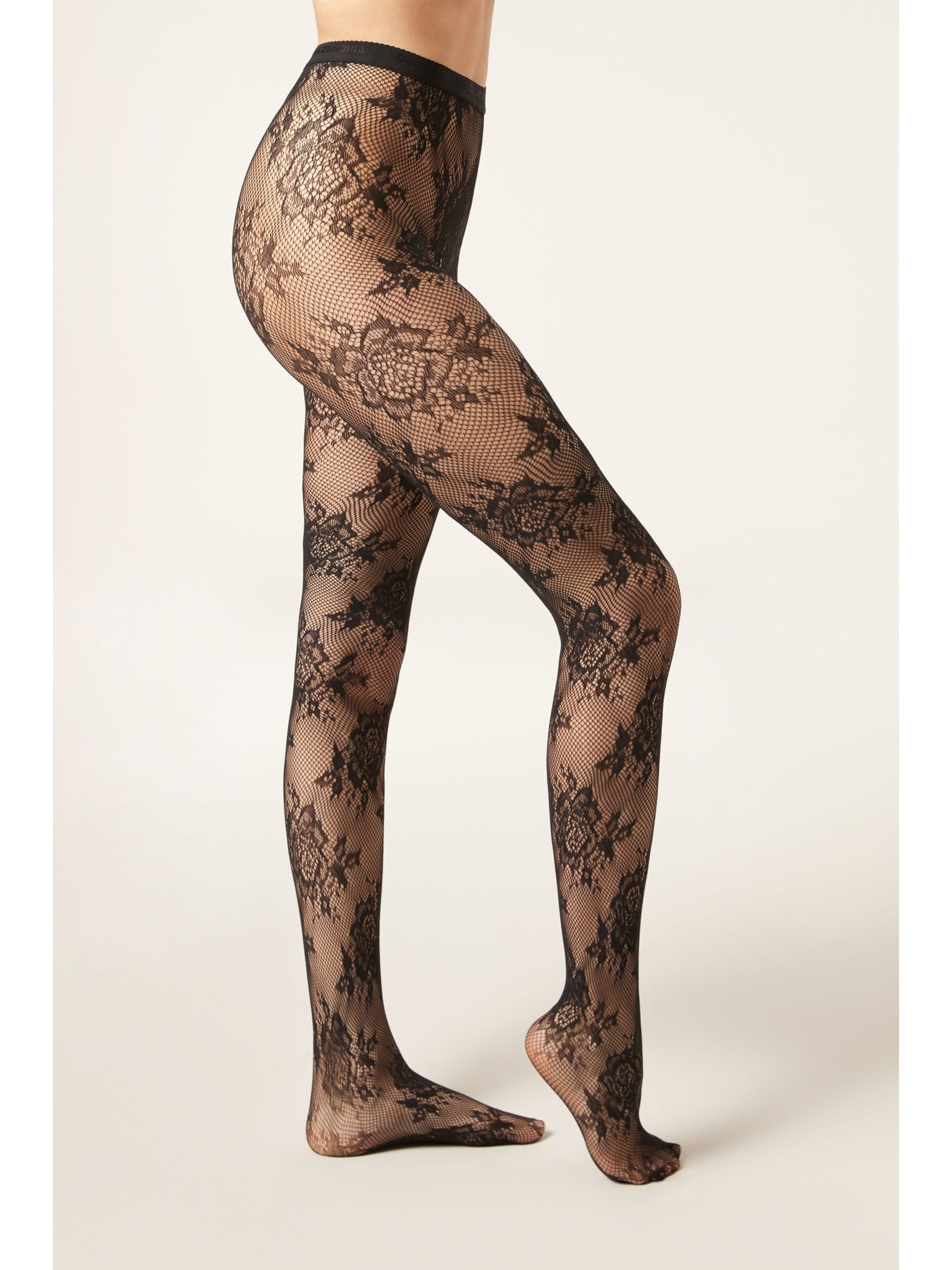 Meia-Calça Arrastão Com Flores Sofisticadas Preto Calzedonia
