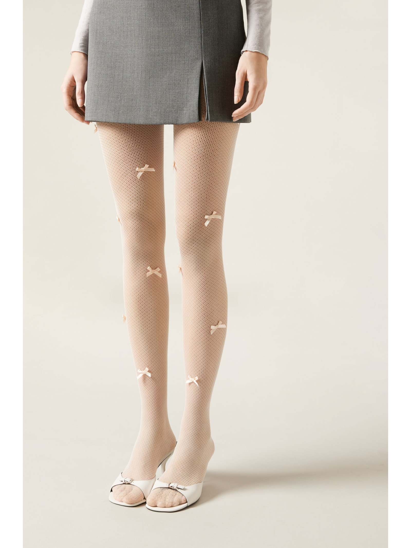 Meia-Calça Arrastão Com Laços Off-White Calzedonia