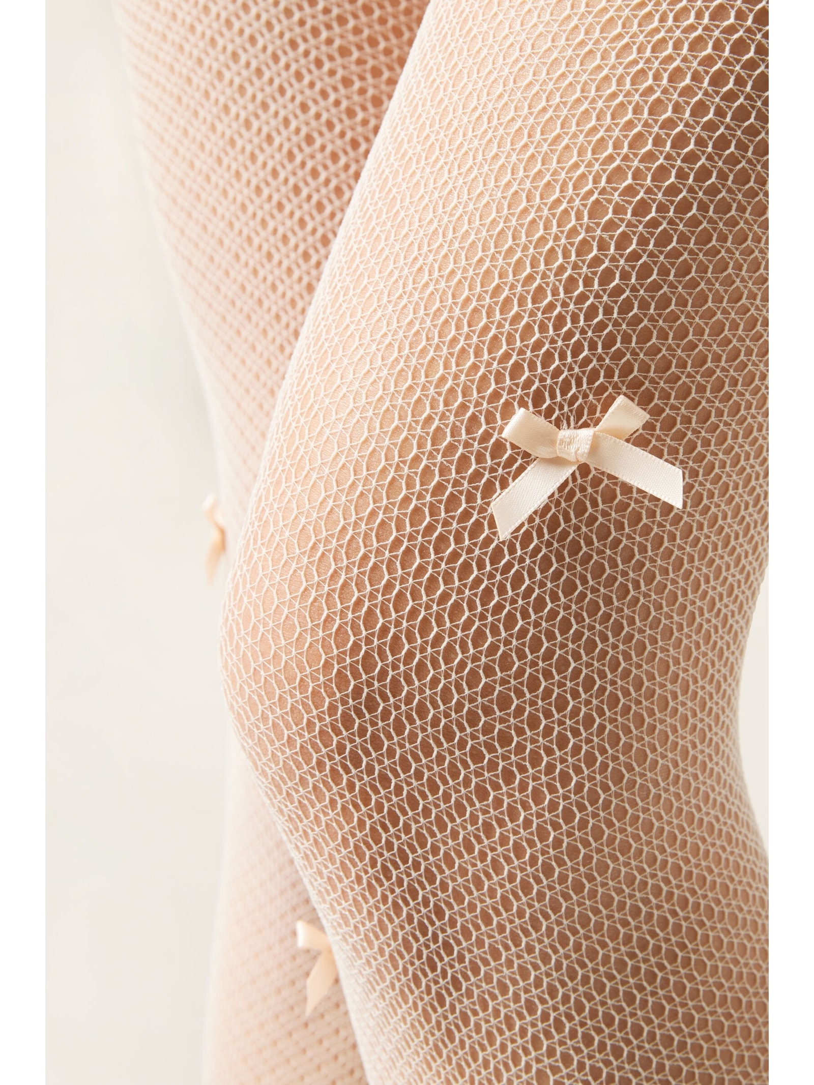 Meia-Calça Arrastão Com Laços Off-White Calzedonia