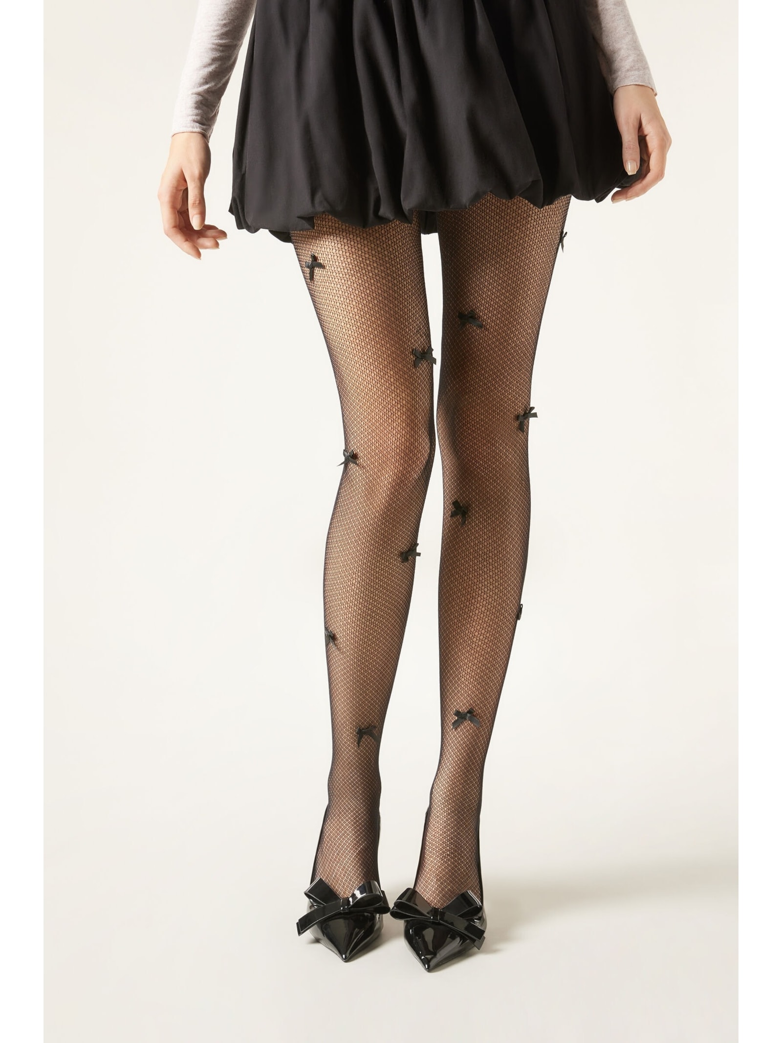 Meia-Calça Arrastão Com Laços Preto Calzedonia