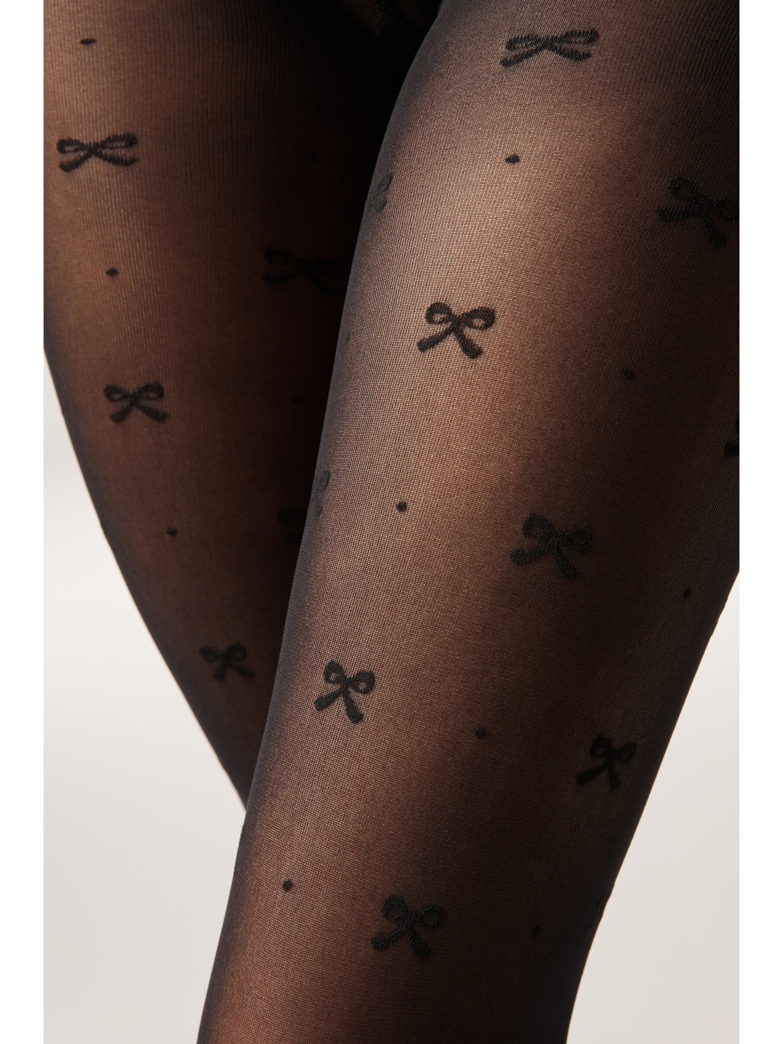 Meia-Calça Transparente Com Laços Em Relevo Fio 30 Preto Calzedonia