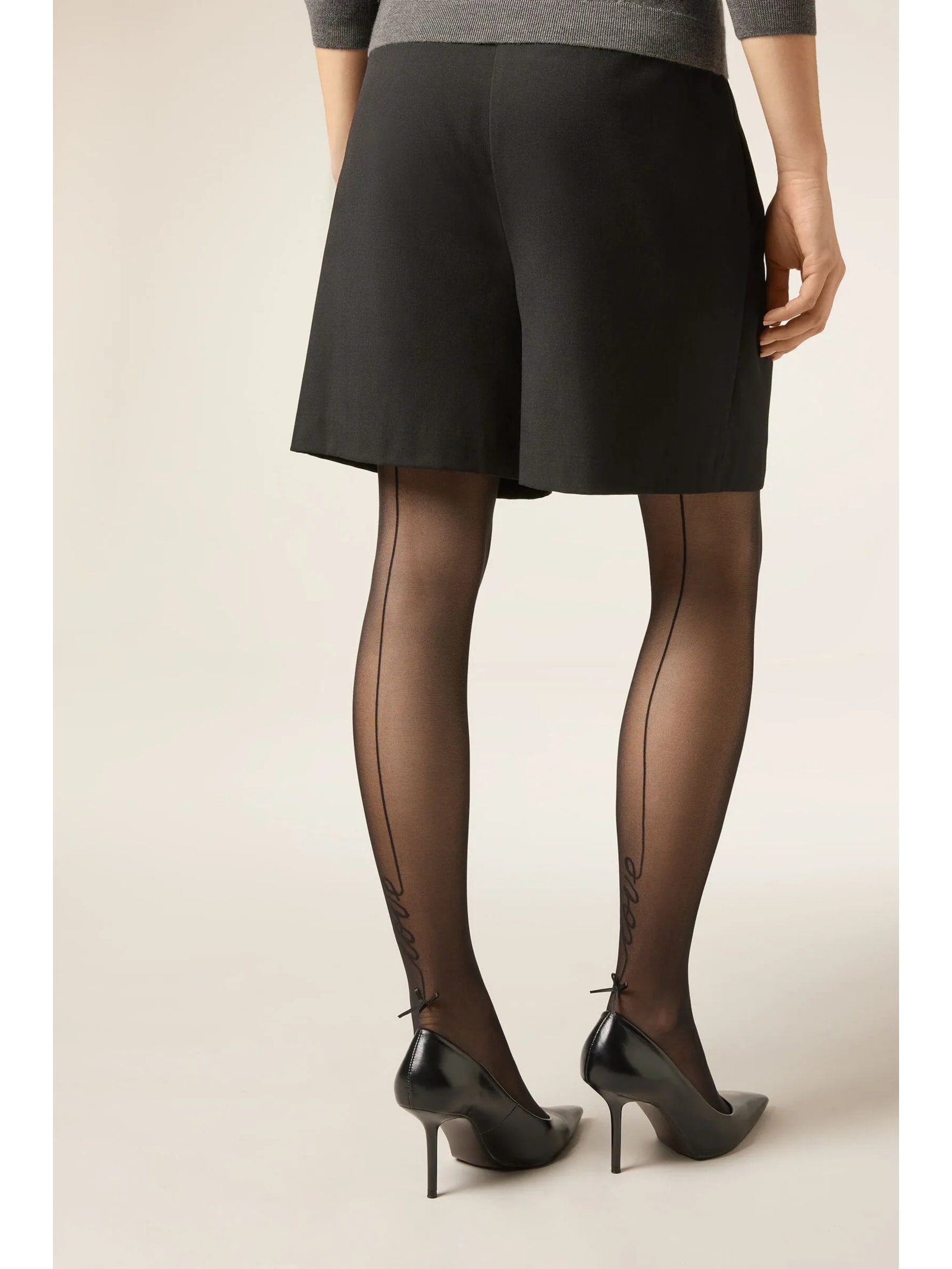 Meia-Calça Transparente Com Linha Posterior e a Palavra “love” Preto Calzedonia