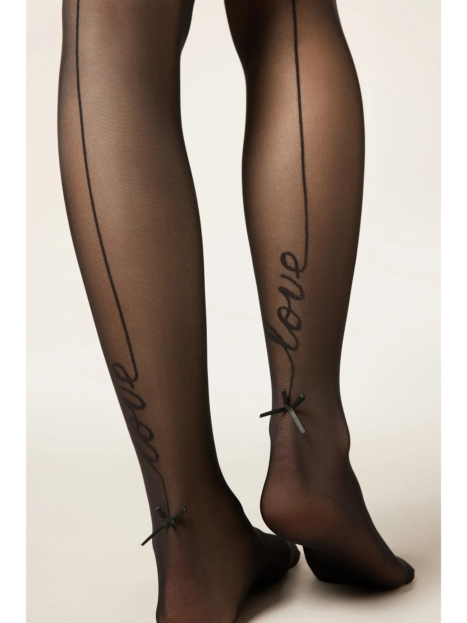 Meia-Calça Transparente Com Linha Posterior e a Palavra “love” Preto Calzedonia